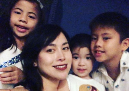 Ivory Aquino with her niece and nephews