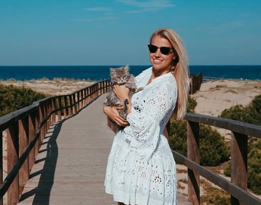 Kim De Klop with her pet cat Lily Grey