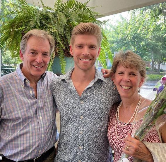 Kyle Cooke with his father and mother