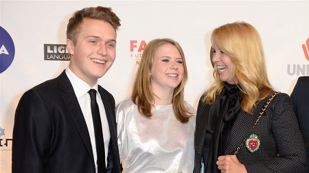 Linda De Mol with her son