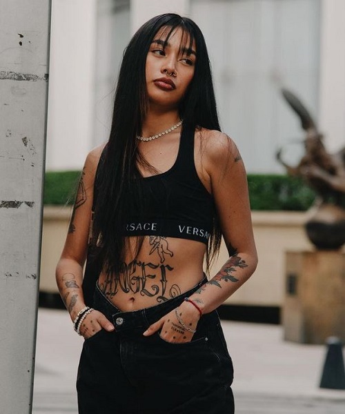Lizeth Selene has tattoos allover her body