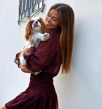 Luisinha with her pet dog