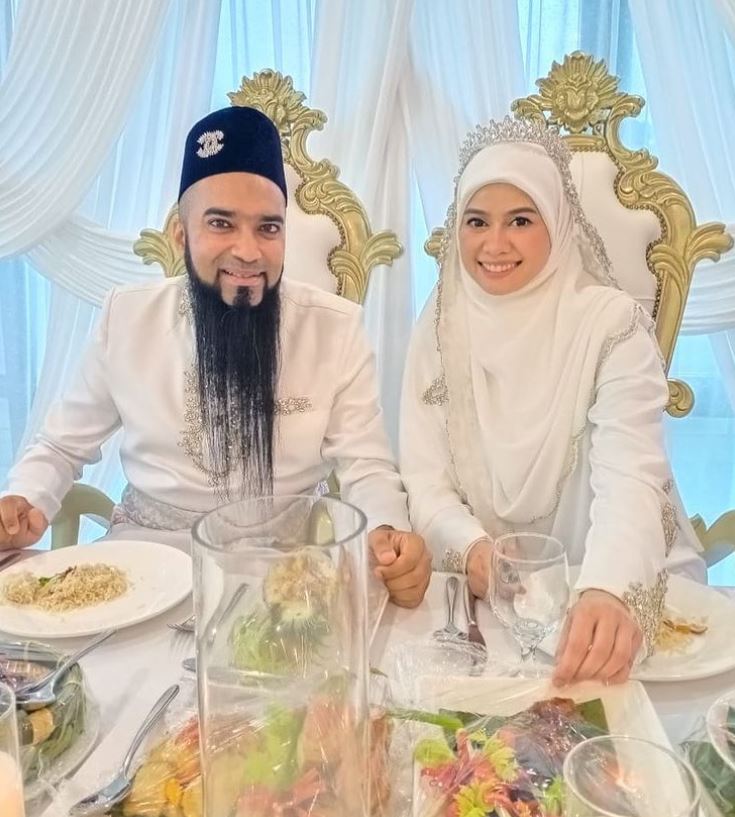 Mahadi Bz with his wife