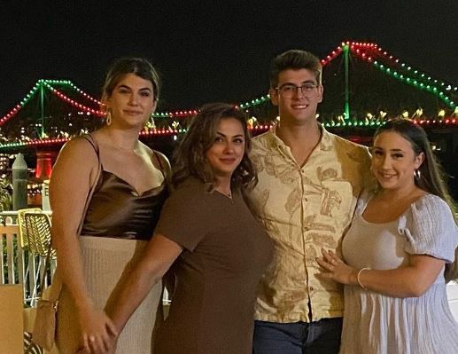 Mishel with her family