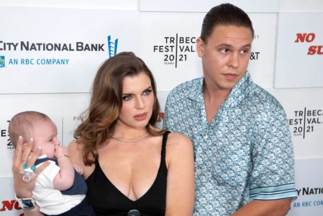 Peter Artemiev with his wife Julia Fox and son