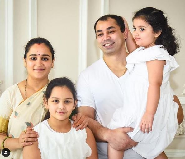 Prateek Yadav with his wife and daughters