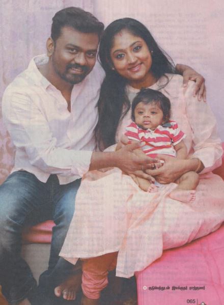 Rajkumar Periasamy with his wife and son