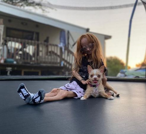 Rose with her pet dog