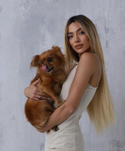 Soleil Sorge with her pet