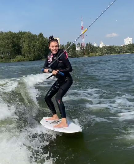 Stasya Miloslavskaya likes surfing