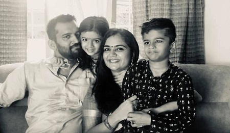 Suja Karthika with her kids and husband