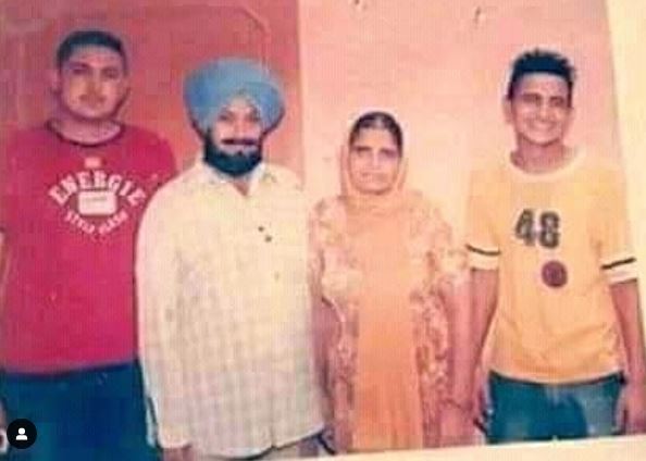 Sukha Kahlon with his father mother and brother