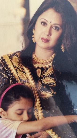 The childhood image of Krisha Shah with her mother