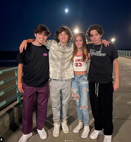 Ava Majury with her best friends