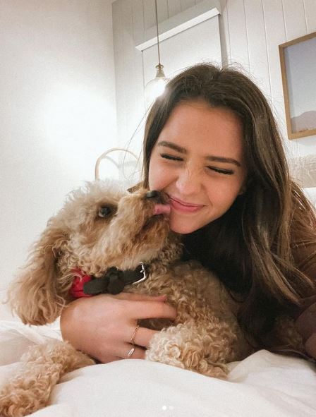 Conte with her pet dog