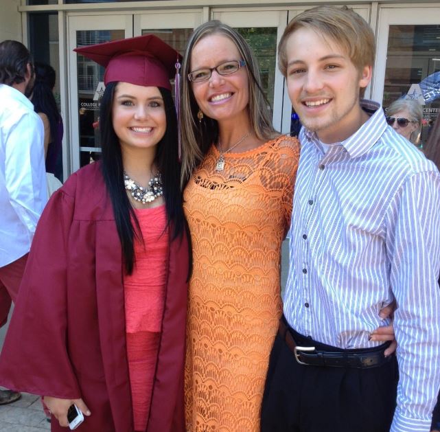 Demi Burnett with her mother and brother