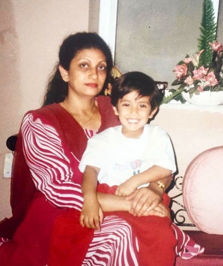 Fahmaan Khan in his childhood sitting with his mother