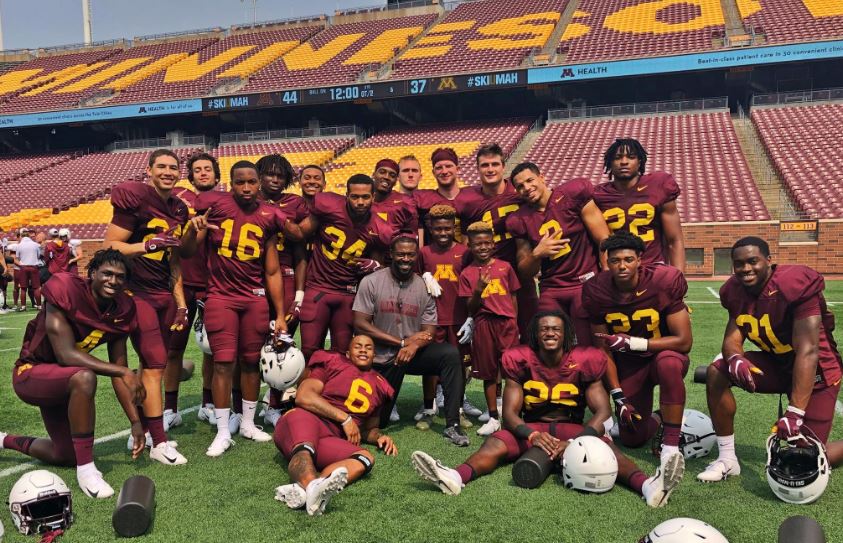 Jahmile with his team