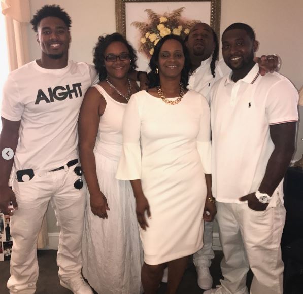 Jonathan with his family members
