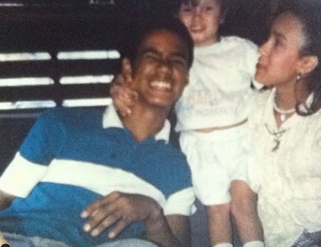 Joy Taylor with her borther in her childhood