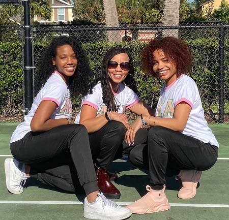 Kim Godwing with her two daughters
