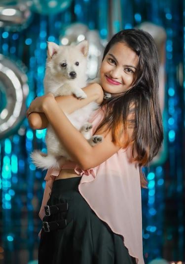 Mamuda and her pet dog