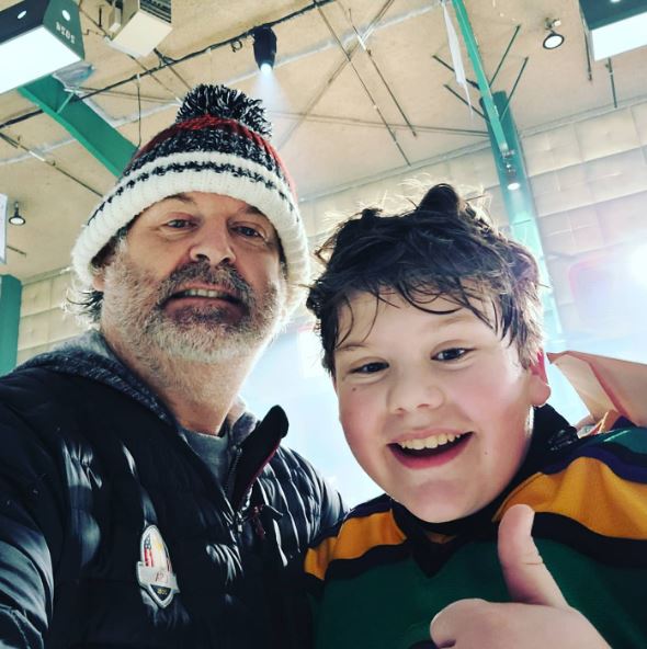 Maxwell Simkins with his father