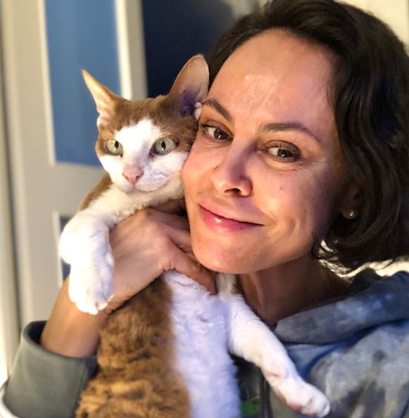 Natalia with her pet cat