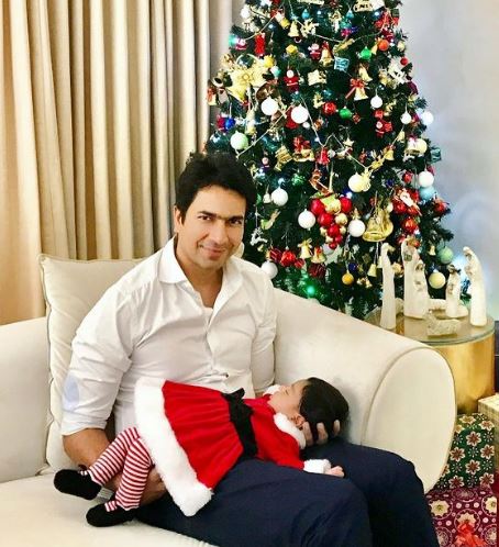 Rahul Sharma with his daughter