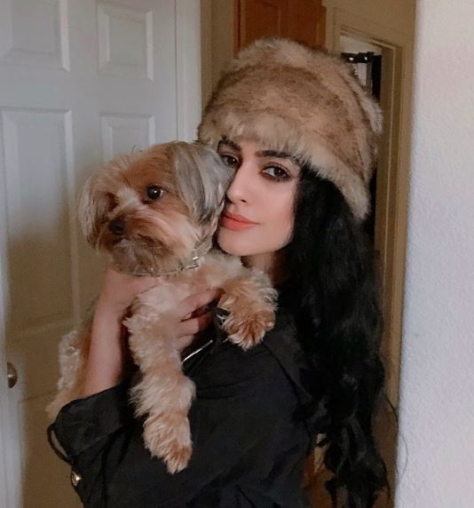 Reena with her pet dog