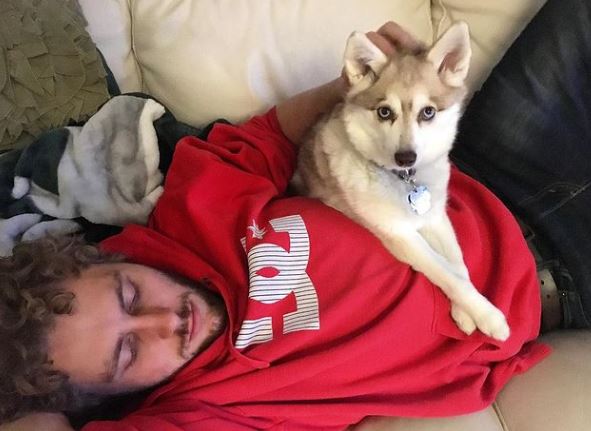 Sandler with his pet dog