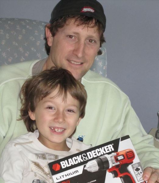 Skylar with his father Brennan Gaertner