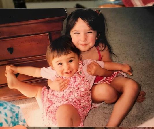 Allegra Miles old image with her sister
