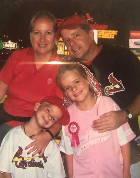 Ally Kostial old image with her dad mom and brother