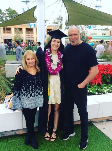 Cassidy Hall with her father and mother