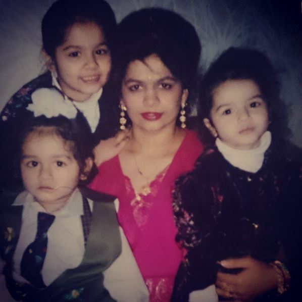 Childhood photo of Harpreet with her mom and siblings