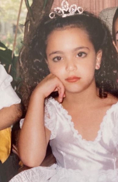 Childhood photo of May