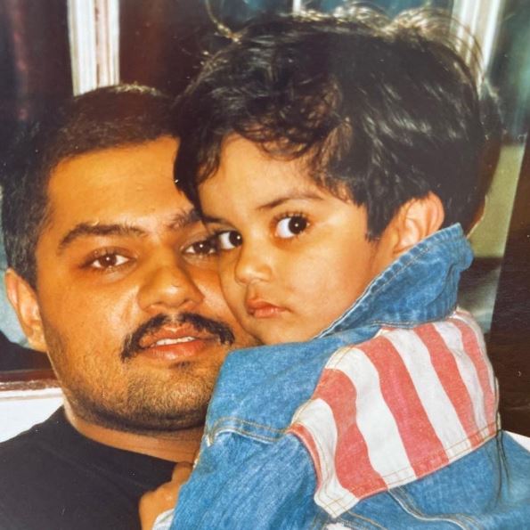 Childhood photo of Umar with his dad Mahmud Kamani