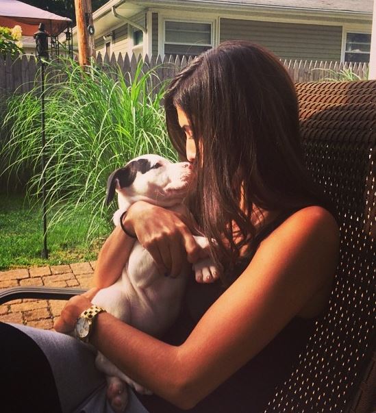 Estee with her pet dog