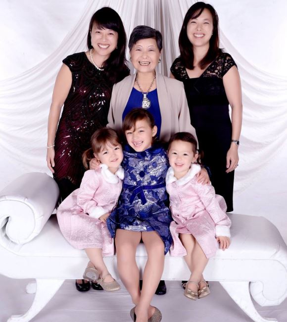 Grace with her cousins and mom