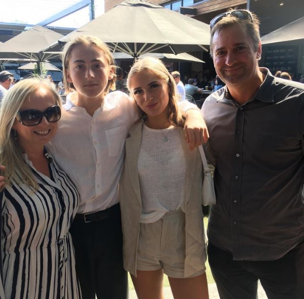 Jason Warne with his wife son and daughter
