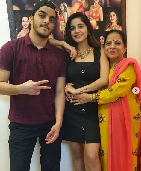 Kate with her mom Meena Sharma and brother Prakash Sharma