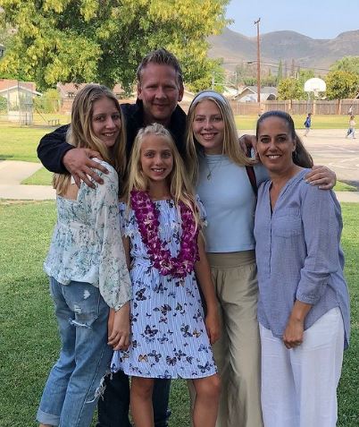 Katie Meyer with her mother father and sisters
