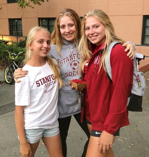 Katie Meyer with her sisters