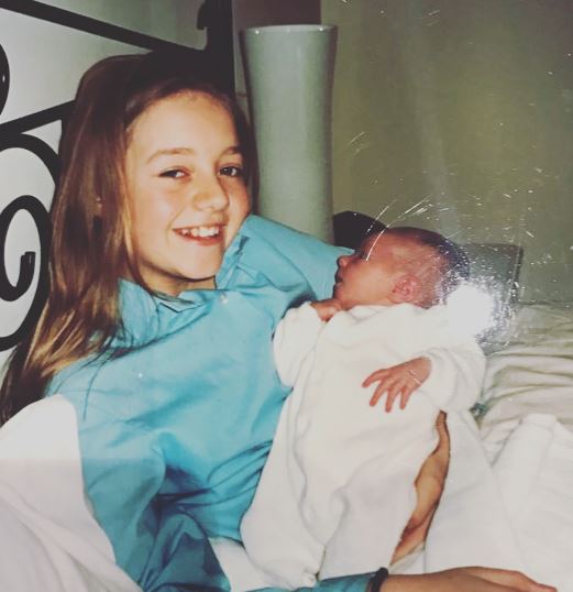 Kelsey Hardwick old image with her little cousin