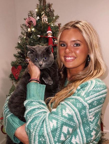 Kenedi with her pet cat