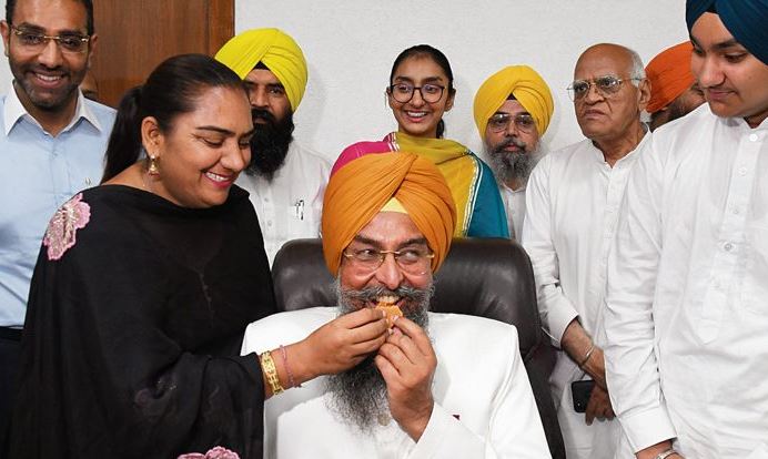 Kultar Singh Sandhwan and his family members