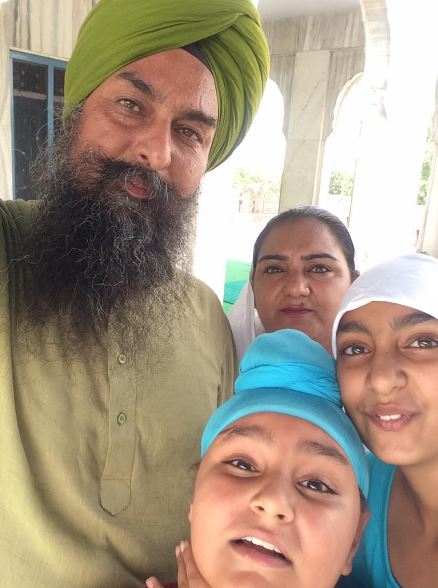 Kultar Singh Sandhwan with his wife daughter and son
