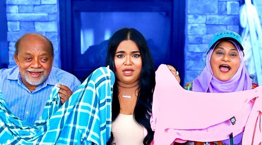 Nabela Noor with her mother and father