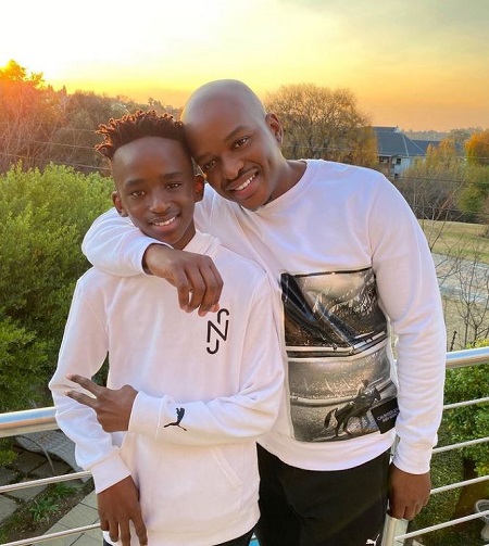 Naked DJ with his son